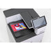 Top view of the icolor 800w output tray holding a vibrant full-color printed sheet beside the tilted control panel