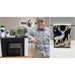 Maker and printed deer artwork beside the xTool O1 Omni UV Printer with decorated project samples