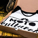 Example output: printed tee in a mailer box