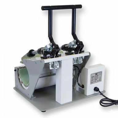 Rear view of the geo knight mug press showing steel frame, open heater band with liner, spec plate and coiled power cable