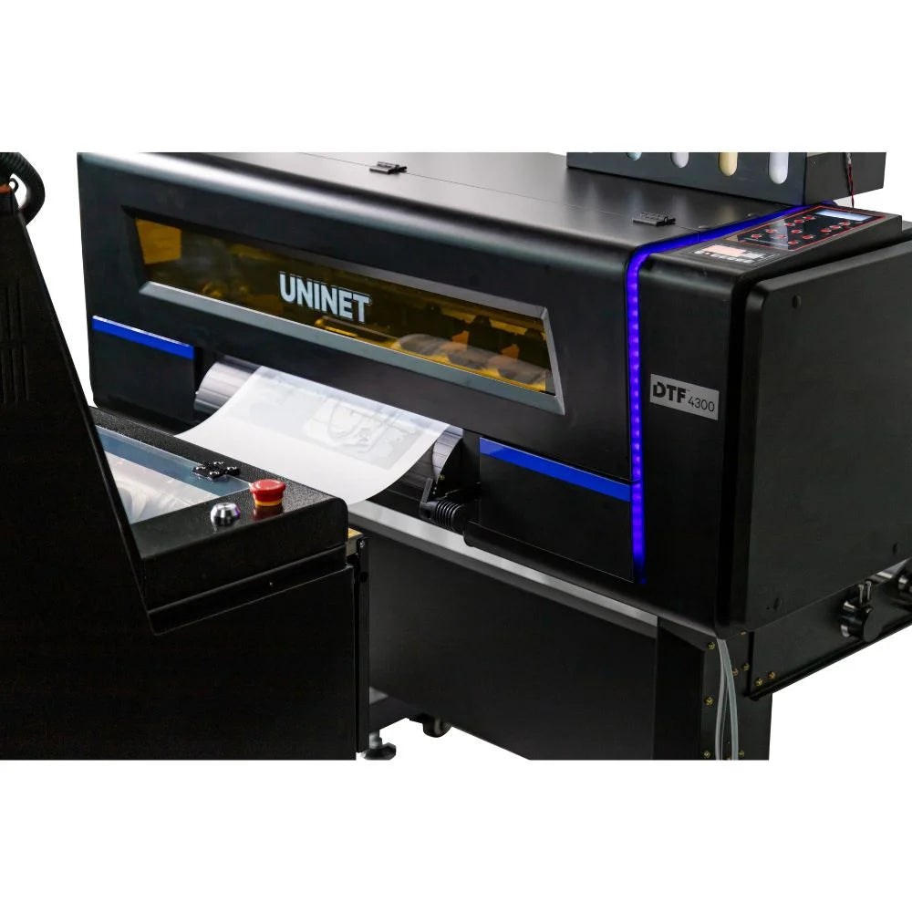 uninet dtf 4300 control area close-up with model badge, keypad and emergency stop button on the shaker