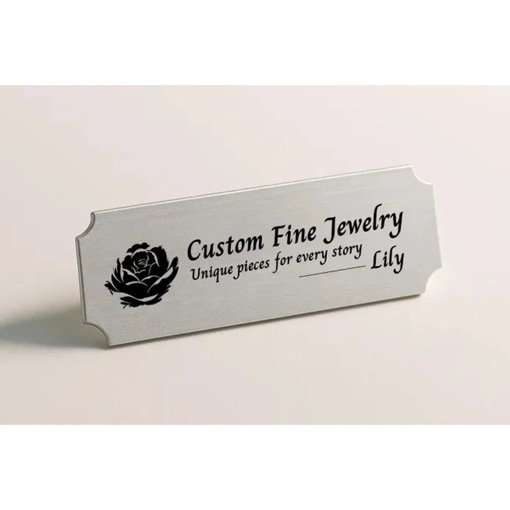 Custom jewelry business nameplate shown as an xTool F2 Ultra Laser Engraver metal sample