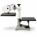 Heater head swung clear of the black lower table on the DC16AP Heat Press by Geo Knights, white studio setting
