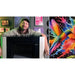 Alternate maker view with vivid hummingbird art beside the xTool O1 Omni Printer