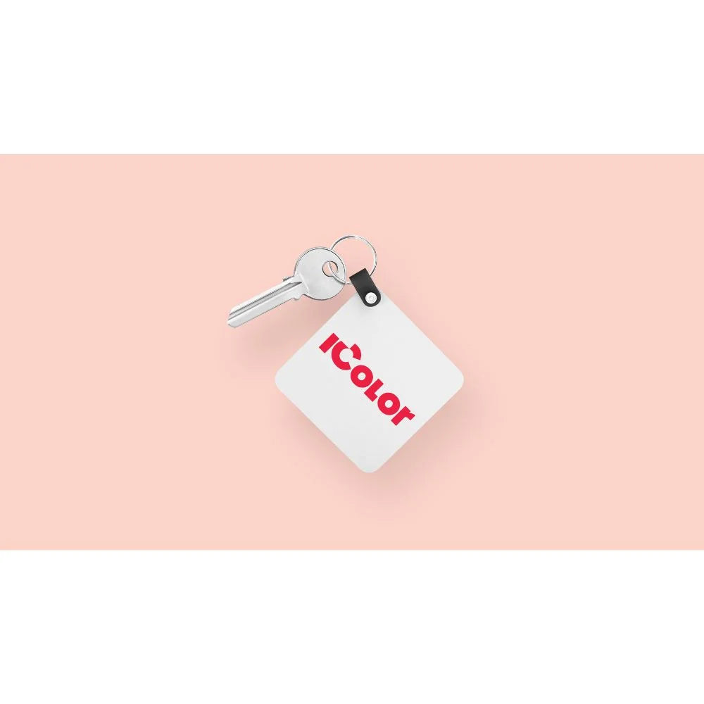White square keychain printed with a red IColor logo demonstrating icolor 350 sublimation printer output on pink