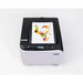 Top view of the icolor 350 printer control panel with Wi-Fi Direct and NFC buttons plus a printed frog transfer sheet