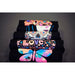 Folded black shirts printed with bright sugar skull and butterfly designs from the IColor Textile Sample Paper Kit