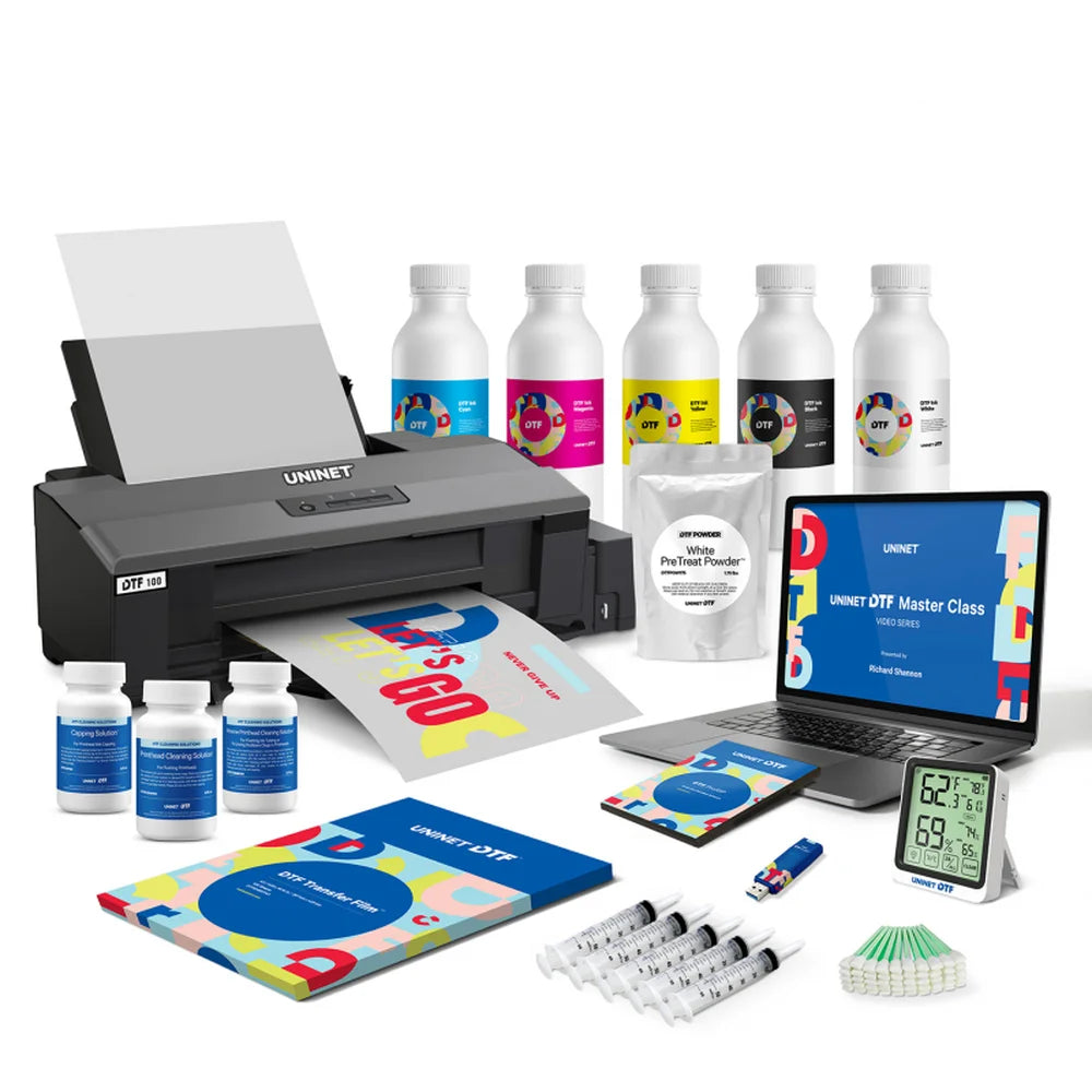 The Icolorprint DTF 100 package includes CMYKW inks, powder, film, syringes, hygrometer, and a training laptop