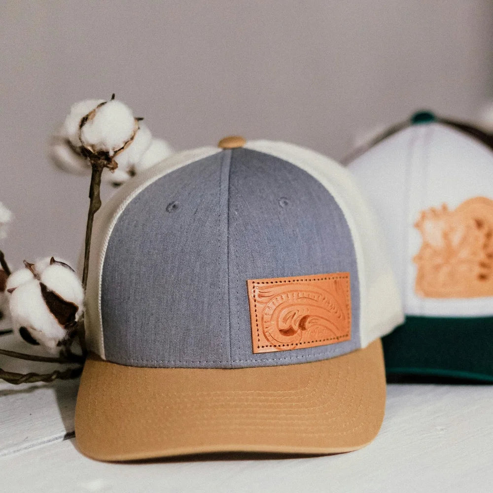 Trucker caps with tooled leather patches, sample results for the Geo Knight DC7AP Heat Press Machine