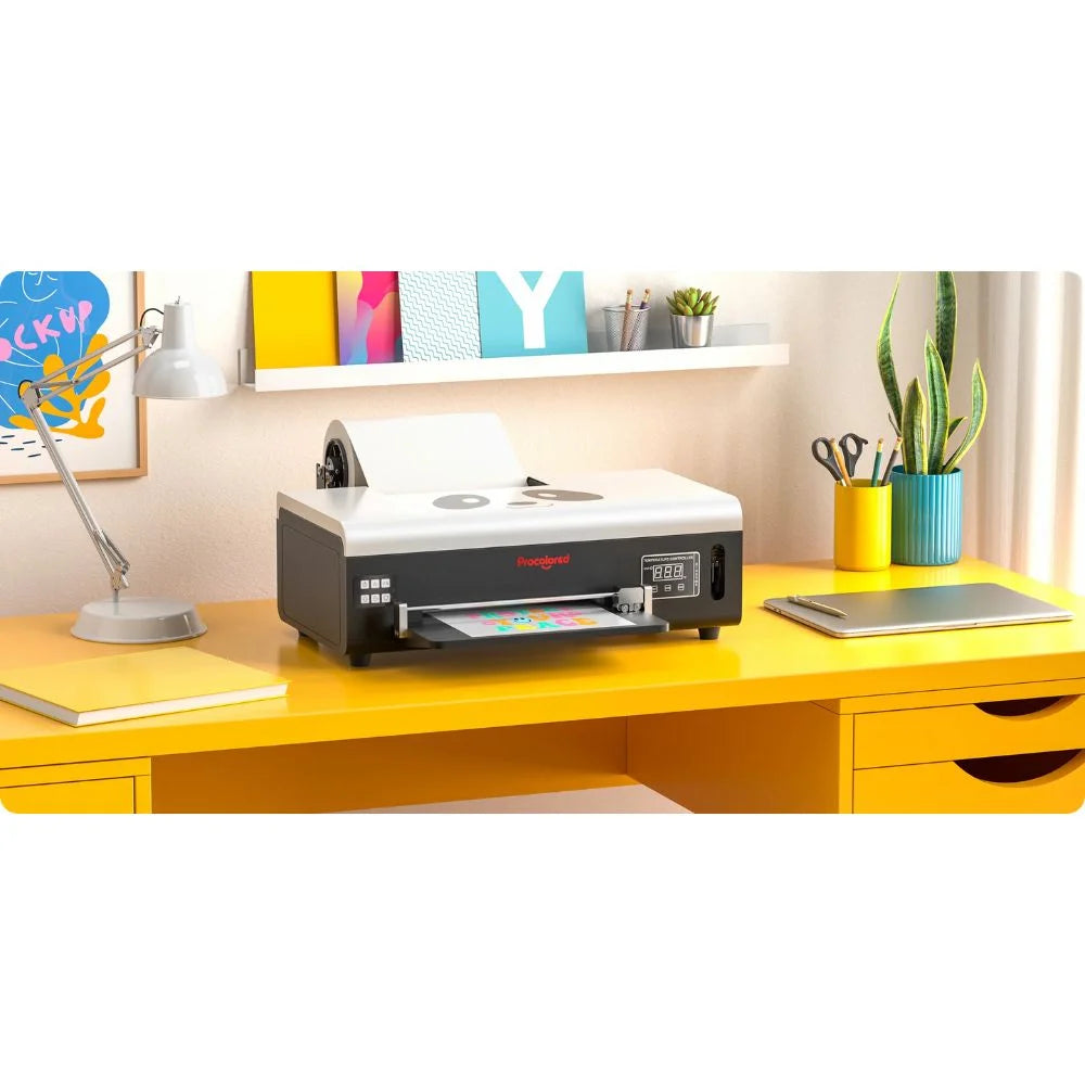 Procolored l805 dtf a4 printer set up on a yellow home studio desk with lamp, plant, and framed wall art