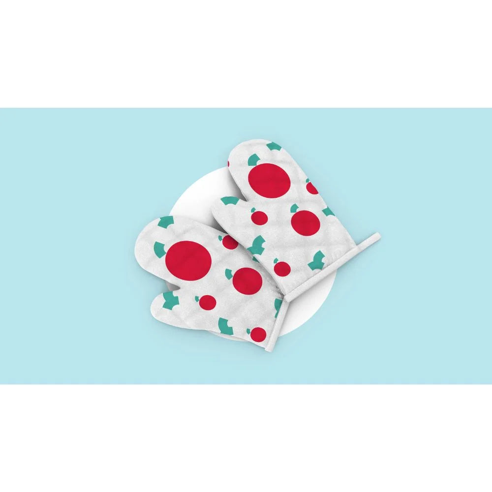 Pair of white oven mitts with red and teal sublimated prints from the icolor 350 shown on a light blue background