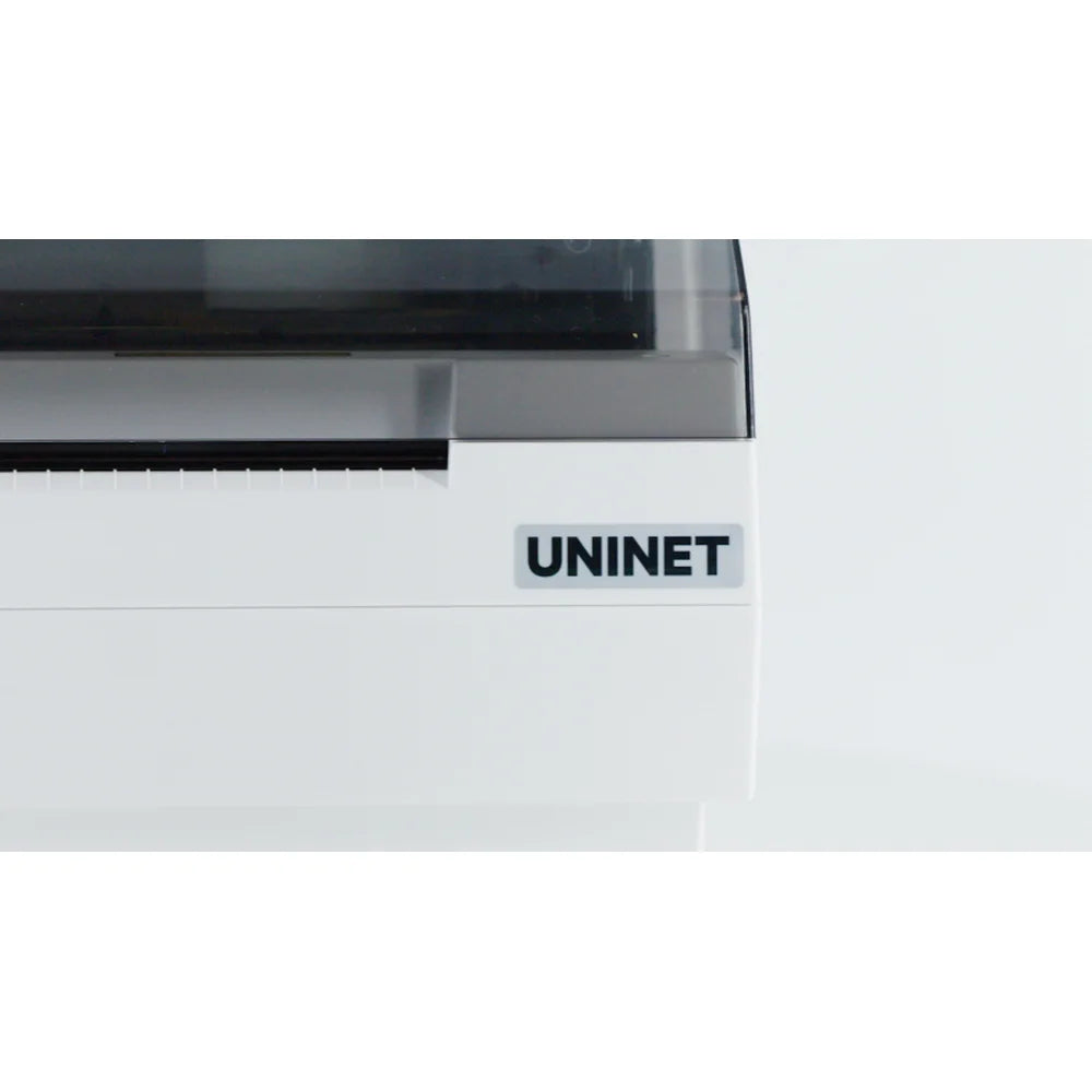 Close-up of the UNINET Label Printer front housing, brand badge, output slot, and tinted top cover