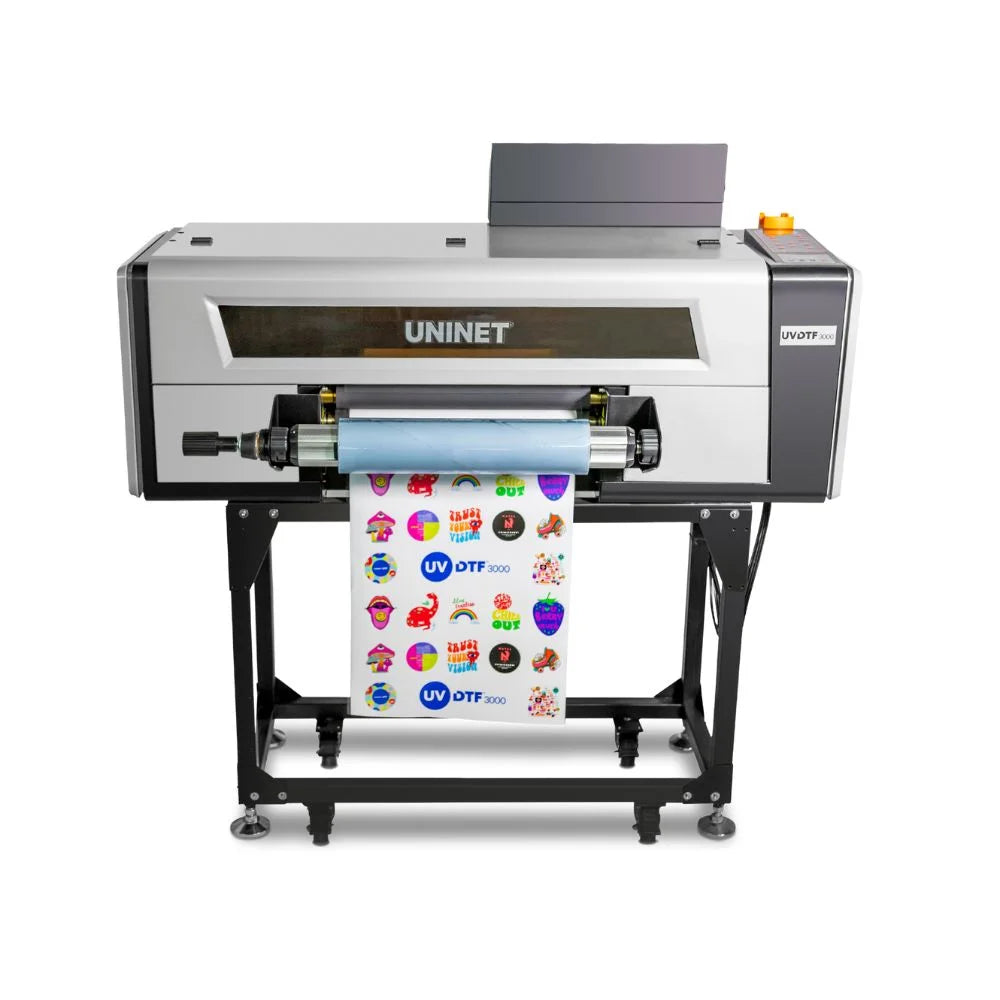 Front view of the Uninet 3000 uv dtf printer on its rolling stand feeding a printed gang sheet of stickers