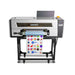 Front view of the Uninet 3000 uv dtf printer on its rolling stand feeding a printed gang sheet of stickers