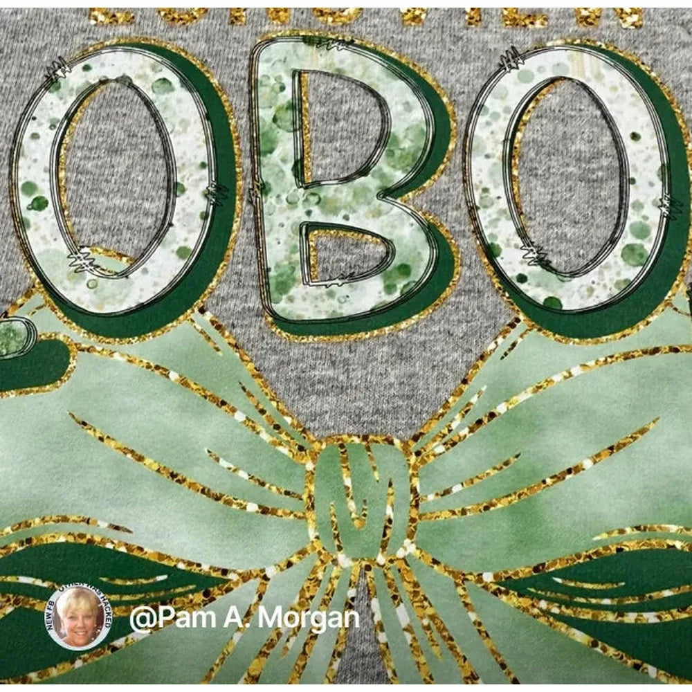 Green and gold garment transfer close-up made with an xTool Apparel Printer shaker oven process
