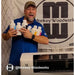 Workshop owner holds printer ink bottles behind the xTool Apparel Printer software unit