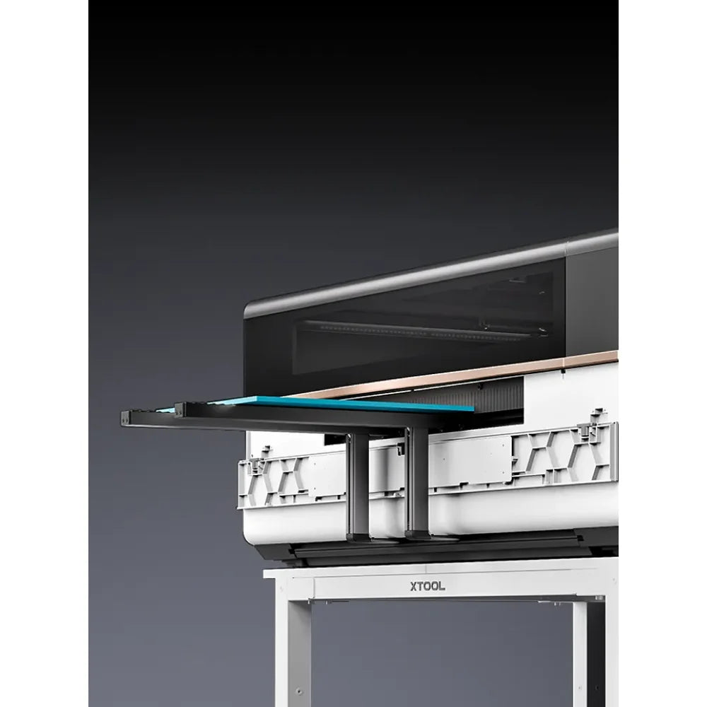 Side view of xTool P3 80w shows conveyor support rails installed through the machine above its stand
